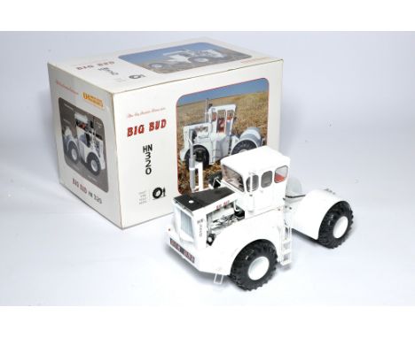 Universal Hobbies 1/16 farm model issue comprising Big Bud HN320 Tractor excellent with minor storage wear to box. 
