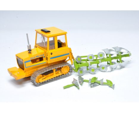 Scaledown Models 1/32 white metal hand-built model tractor issue comprising Track Marshall 135 with Dowdeswell plough. Tracto