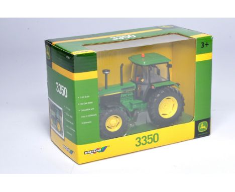 Britains 1/32 farm model issue comprising No.42903 John Deere 3350 Tractor. Excellent and secure in very good to excellent bo