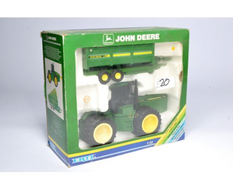 Ertl 1/32 farm model issue comprising No.5624 John Deere Battery Operated Tractor with Power-Driven Barge Wagon. Excellent an