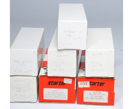 A group of 1/43 model vehicle kits comprising duo of starter issues, both MG Metro plus 5 assorted K&amp;R Triumph TR3 kits. 