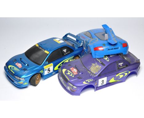 Radio Controlled 1/10 scale Suburu Impreza plus body shells. 