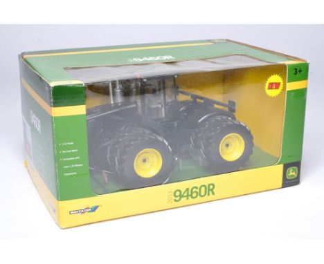 Britains based Code 3 1/32 farm model issue comprising John Deere Tractor (Black). Excellent and secure in very good to excel