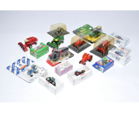 A quantity of smaller scale tractor and farm vehicle issues including 1/43, 1/64 and 1/87. Universal Hobbies, Siku and Wiking