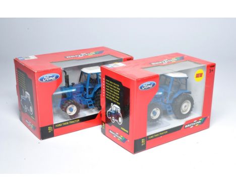 Britains 1/32 farm model duo comprising Ford TW20 and TW30 Tractor issues. Both look to be without obvious sign of fault, alb