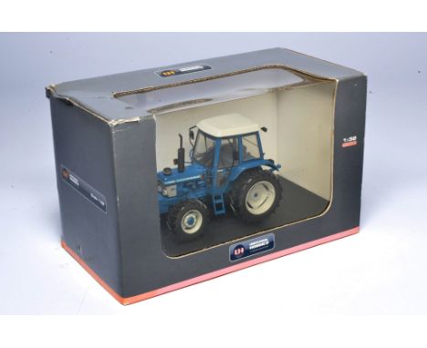 Universal Hobbies 1/32 farm model issue comprising Ford 7610 Gen.1 - 4WD Tractor, minor storage wear- in original box. 