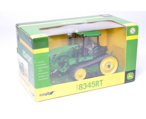 Britains 2009 1/32 farm model issue comprising No.42598 John Deere 8345RT Tractor. Excellent and secure in very good to excel