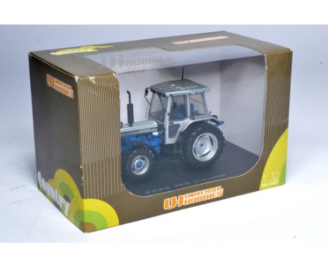 Universal Hobbies 1/32 farm model issue comprising Ford 7810 Silver Jubilee Tractor, excellent and secure in original box. 