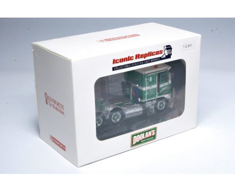 Iconic replicas 1/50 model truck issue comprising Kenworth tractor unit in the livery of Doolans. Looks to be without obvious
