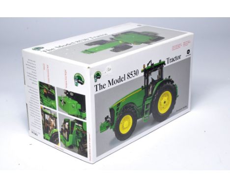Britains 1/32 Farm model issue comprising John Deere 8530 Tractor. Precision Series. Excellent and secure in box. 
