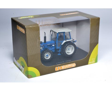 Universal Hobbies 1/32 farm model issue comprising Ford 7810 Tractor, excellent and secure in original box. 