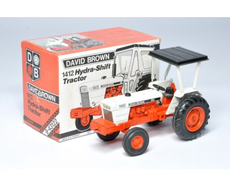 NZG larger scale David Brown 1412 Tractor. Displays generally good with minor signs of wear. Missing exhaust. In good origina