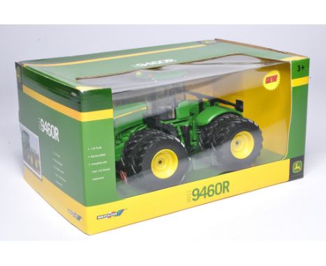 Britains 1/32 farm model issue comprising No.42824 John Deere 9460R Tractor. Excellent and secure in very good to excellent b