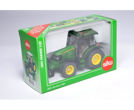 Siku 1/32 farm model issue comprising John Deere 5820 Tractor. Excellent and secure in very good to excellent box. 