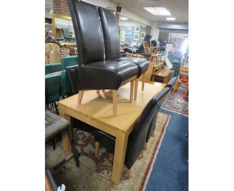 A MODERN LIGHT OAK EFFECT DINING TABLE &amp; SIX CHAIRS