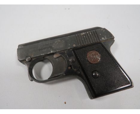 A VINTAGE EM-GE STARTER PISTOL