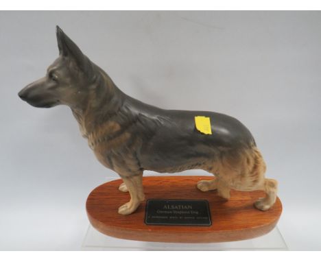 A BESWICK FIGURE OF A GERMAN SHEPHERD DOG 