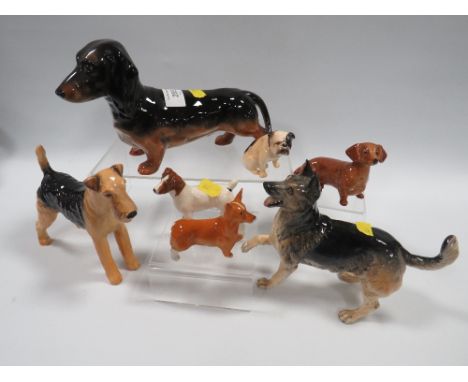 A SELECTION OF BESWICK AND OTHER DOG FIGURES (7)