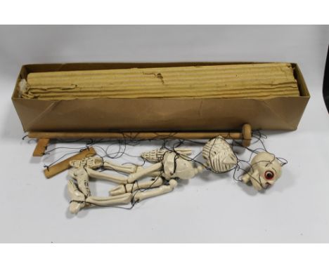 A VINTAGE PELHAM PUPPET IN THE FORM OF A SKELETON IN ORIGINAL BOX A/F 