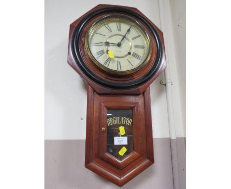 A MAHOGANY CASED 31 DAY REGUALTOR CLOCK