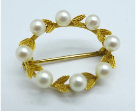 A yellow metal and pearl brooch, 3.4g, (unclear mark, possibly 9ct gold) 