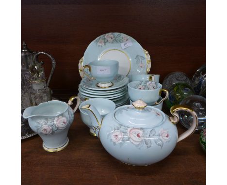 A six setting Aynsley tea service; teapot, six cups, six saucers, six side plates, cake plate, cream jug, (lacking sugar bowl