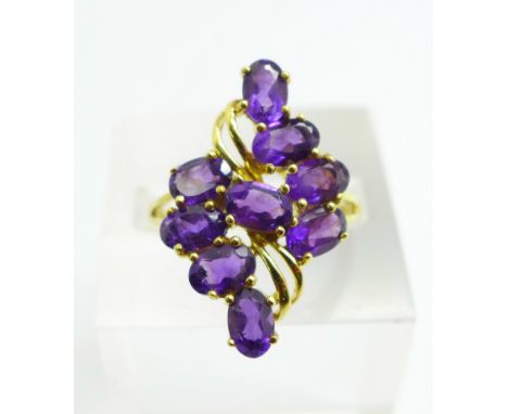A silver gilt and amethyst cluster ring, R 