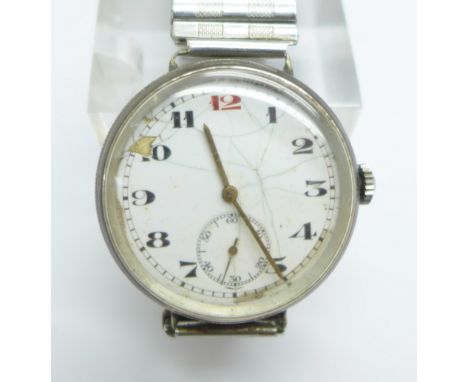 A silver cased Longines wristwatch, London import mark for 1924, 33mm case, dial a/f, on a Fixo-Flex expanding strap, the but
