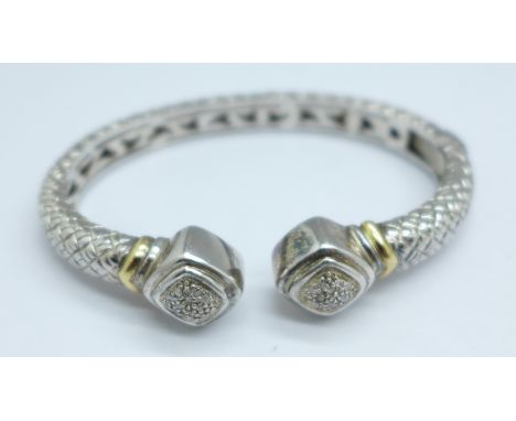 A 925 silver and diamond set bangle, with 14ct yellow gold mounted 'shoulders', with single side hinge, 38g 