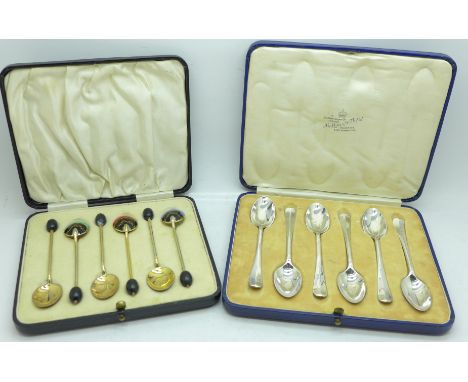 A cased set of six Art Deco coffee bean spoons with enamel decoration, unmarked gilt metal, together with a set of six silver