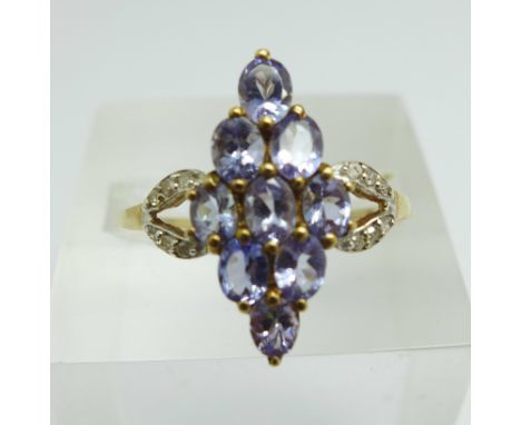 A 9ct gold, tanzanite and diamond ring, 2.1g, R 