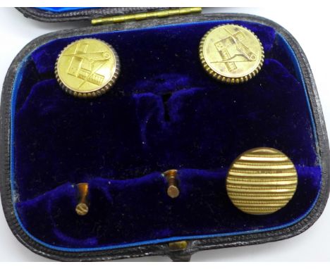 A pair of 15ct gold Masonic studs/buttons, 5.1g, 18mm diameter, one other stud/button and two small studs, one marked 9ct gol