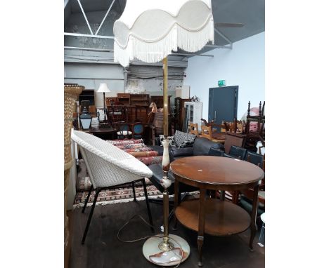 An onyx and brass effect standard lamp 