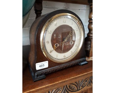 A Smiths Art Deco oak mantle clock. 