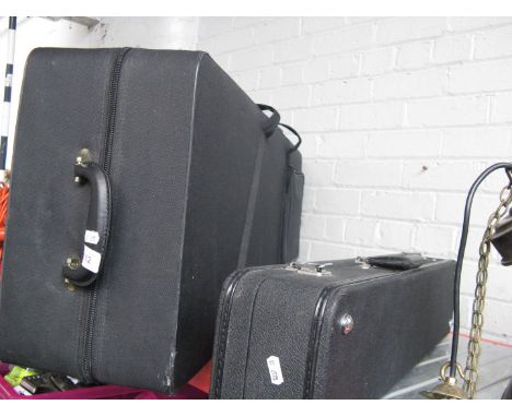 A saxophone case and a clarinet case 