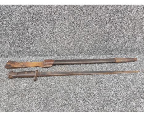 A WWI bayonet stamped Hembrug, in leather scabbard.