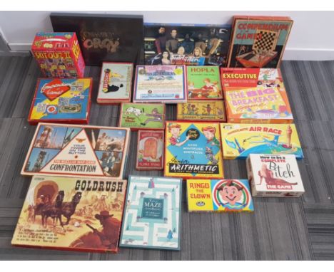 Box containing 20 boxed vintage games including Goldrush, Star Trek the next generation and a compendium of games