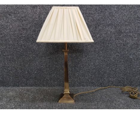 Super polished brass square column table lamp with pleated shade.