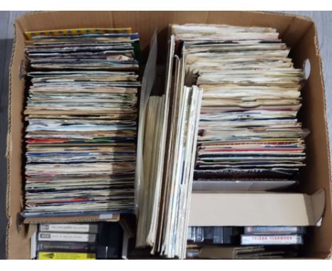 Box containing a large Quantity of 45's records including 3 by the beatles, from me to you, we can work it out and ticket to 