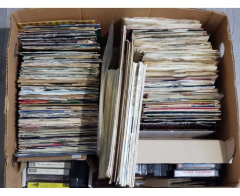 Box containing a large Quantity of 45's records including 3 by the beatles, from me to you, we can work it out and ticket to 