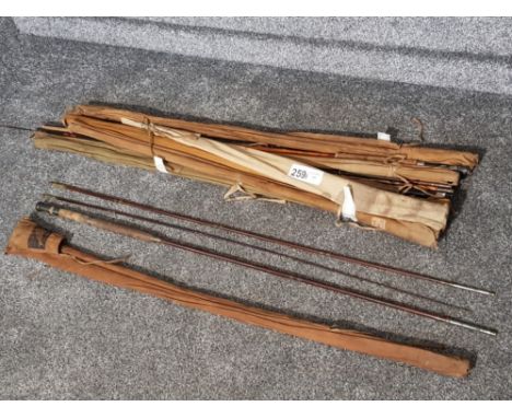 Bundle of vintage fishing rods by Farlow and Mortan etc