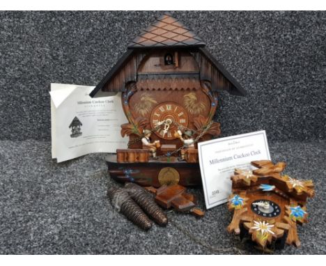 German Danbury Mint Millennium 2000 hand carved wooden cuckoo clock with pendulum, weights and certificate of authenticity pl