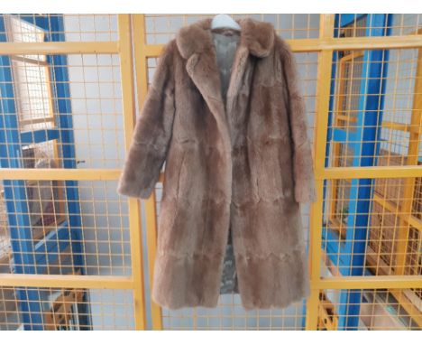 A ladies three quarter length light brown mink fur coat, size 10 approx.