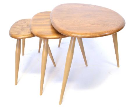 Ercol elm nest of three 'Pebble' tables Ercol elm nest of three 'Pebble' tables, model 354, each standing on three tapering l