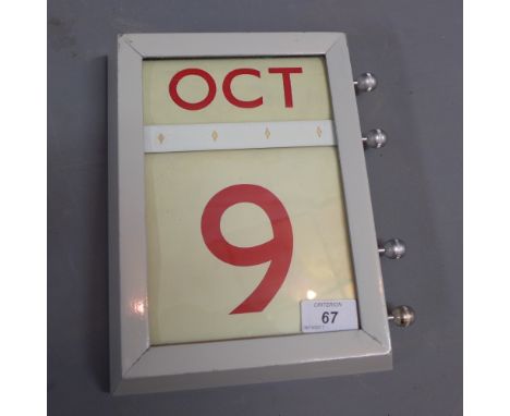 A 1950's date display, makers mark to verso. H.26cm