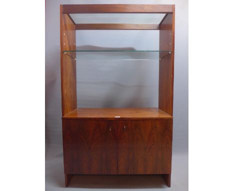 An Archie shine rosewood display unit/room divider with glass top and shelf above two cupboard doors. H-153cm, W-91cm, D-46cm