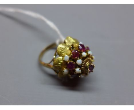 A yellow gold, opal and garnet thai style 'princess' ring, approx 6g