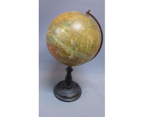 An Edwardian "Geographia" Terrestrial globe on mahogany stand. 