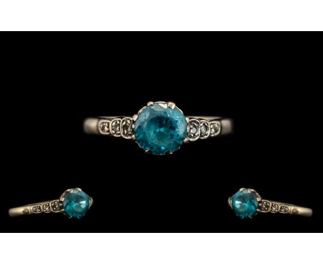 18ct Aquamarine &amp; Diamond Set Ring in White Gold.  Aquamarine stone approx. 1 ct, flanked with diamonds to shoulder and s