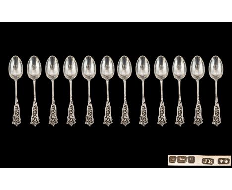 Art Nouveau Exquisite Set of 12 Sterling Silver Teaspoons with stylised Art Nouveau handles.  Hallmark Sheffield 1908.  Maker